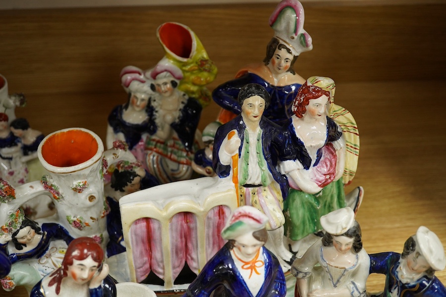 Sixteen various Staffordshire figures, tallest 27cm. Condition - varies